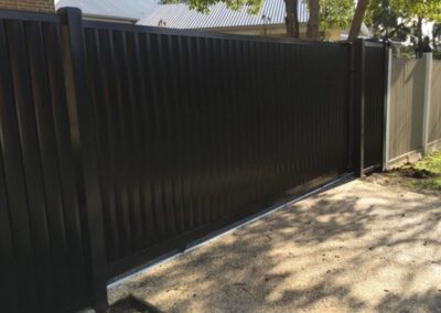 black colorbond sliding gate installation